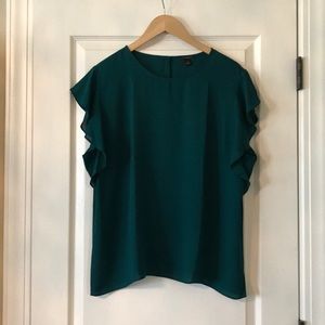 Emerald green flutter sleeve blouse